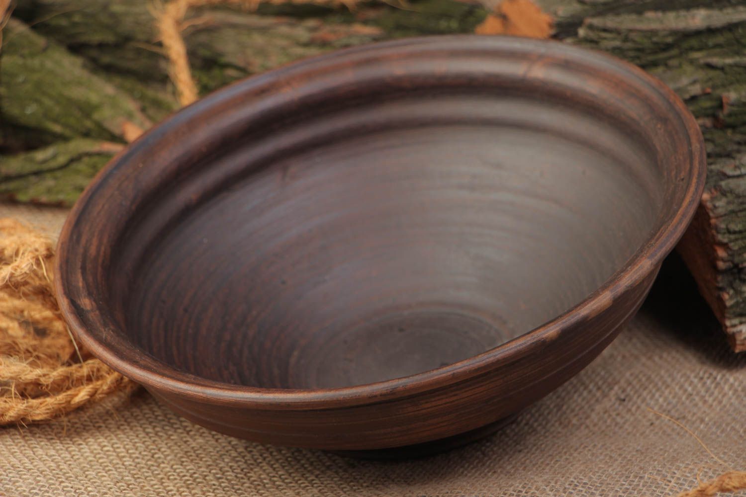 Decorative dark brown ceramic bowl molded of red clay kilned with milk 800 ml photo 1