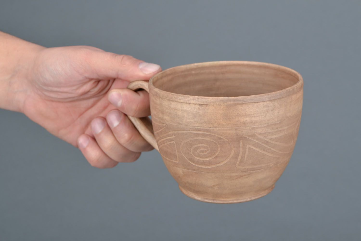 White clay unglazed cup with handle and Greek-style pattern photo 2