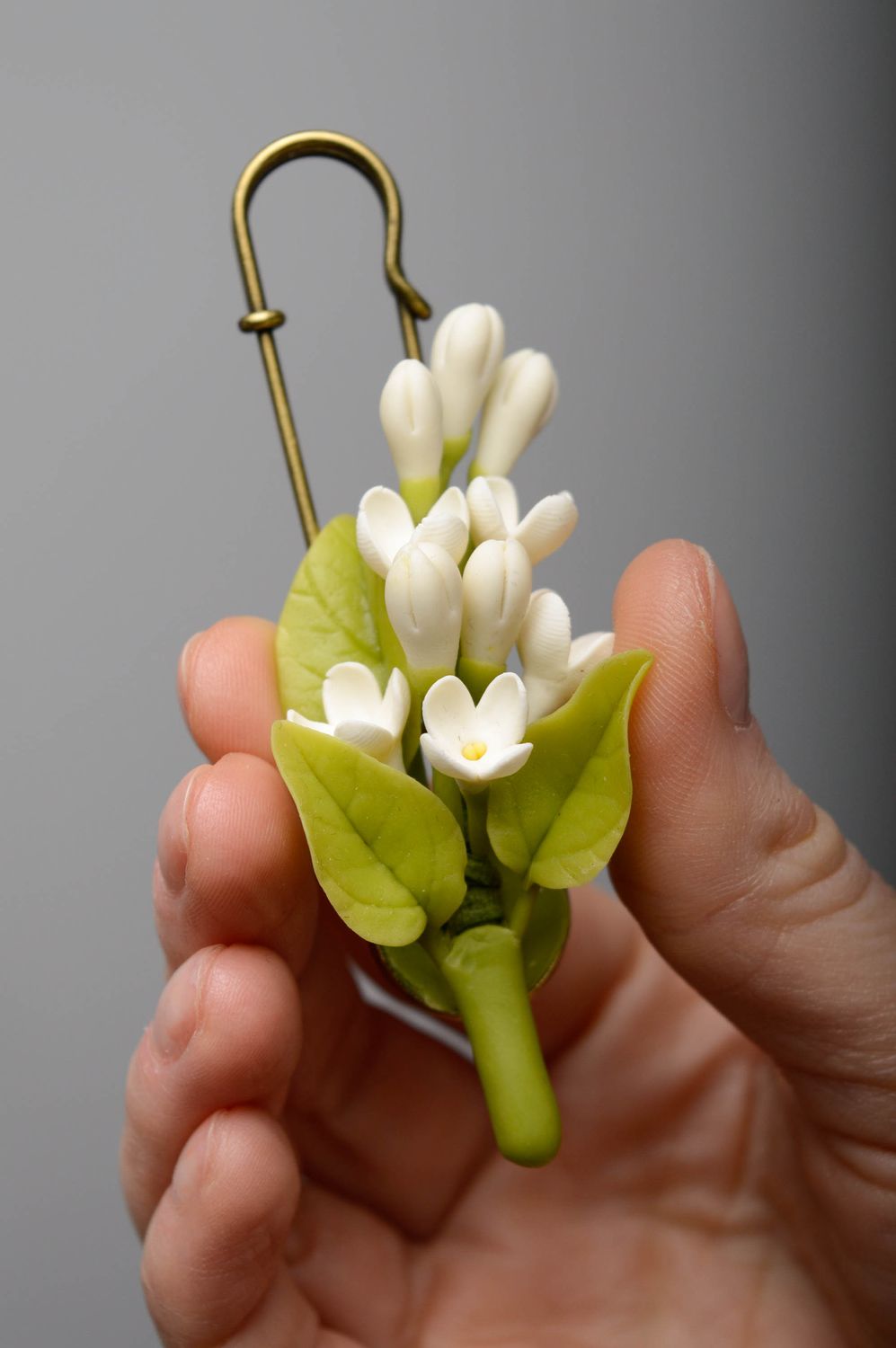 Broche en porcelaine froide faite main avec fleurs photo 3