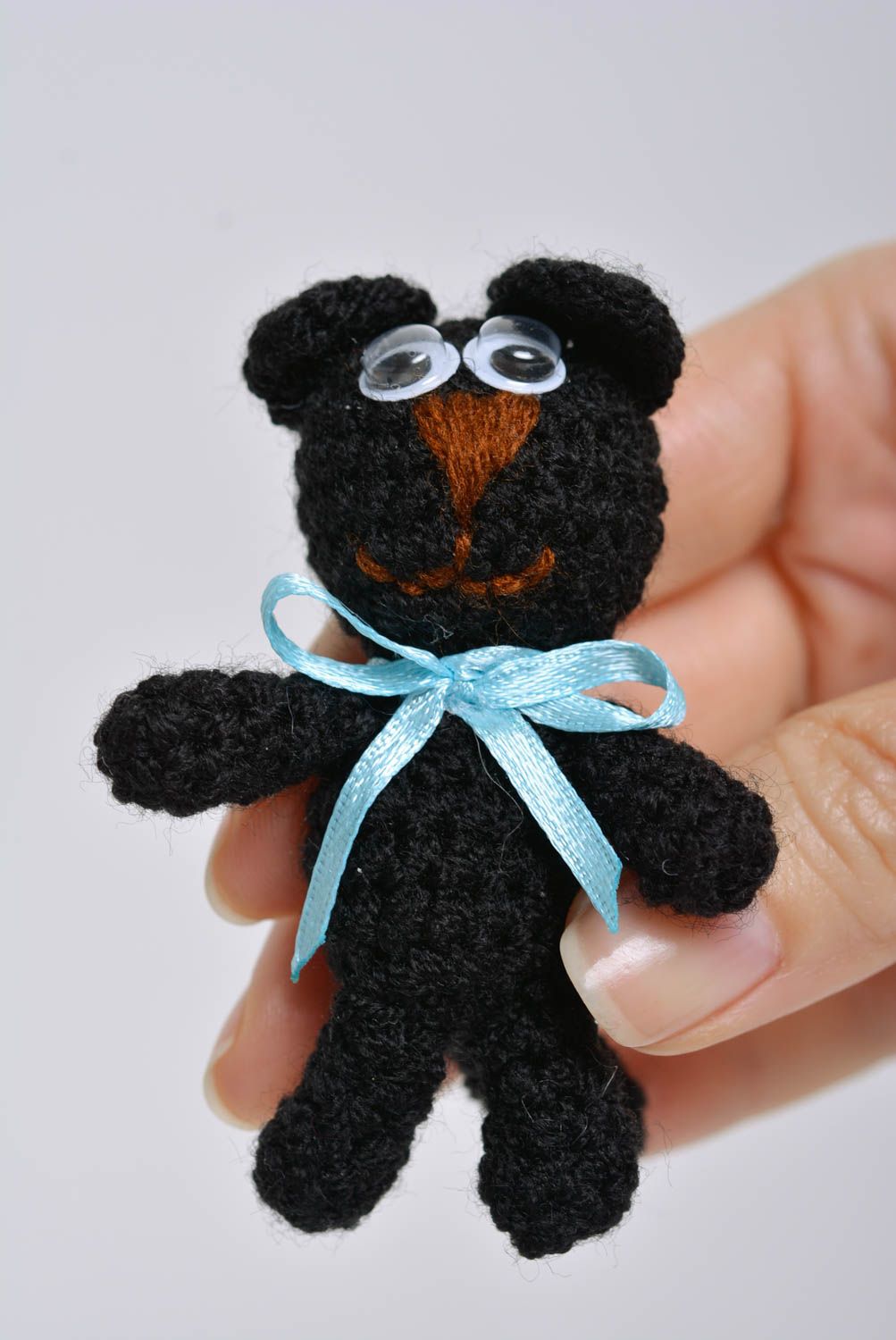 Small black children's handmade soft toy kitty crocheted of acrylic threads photo 4