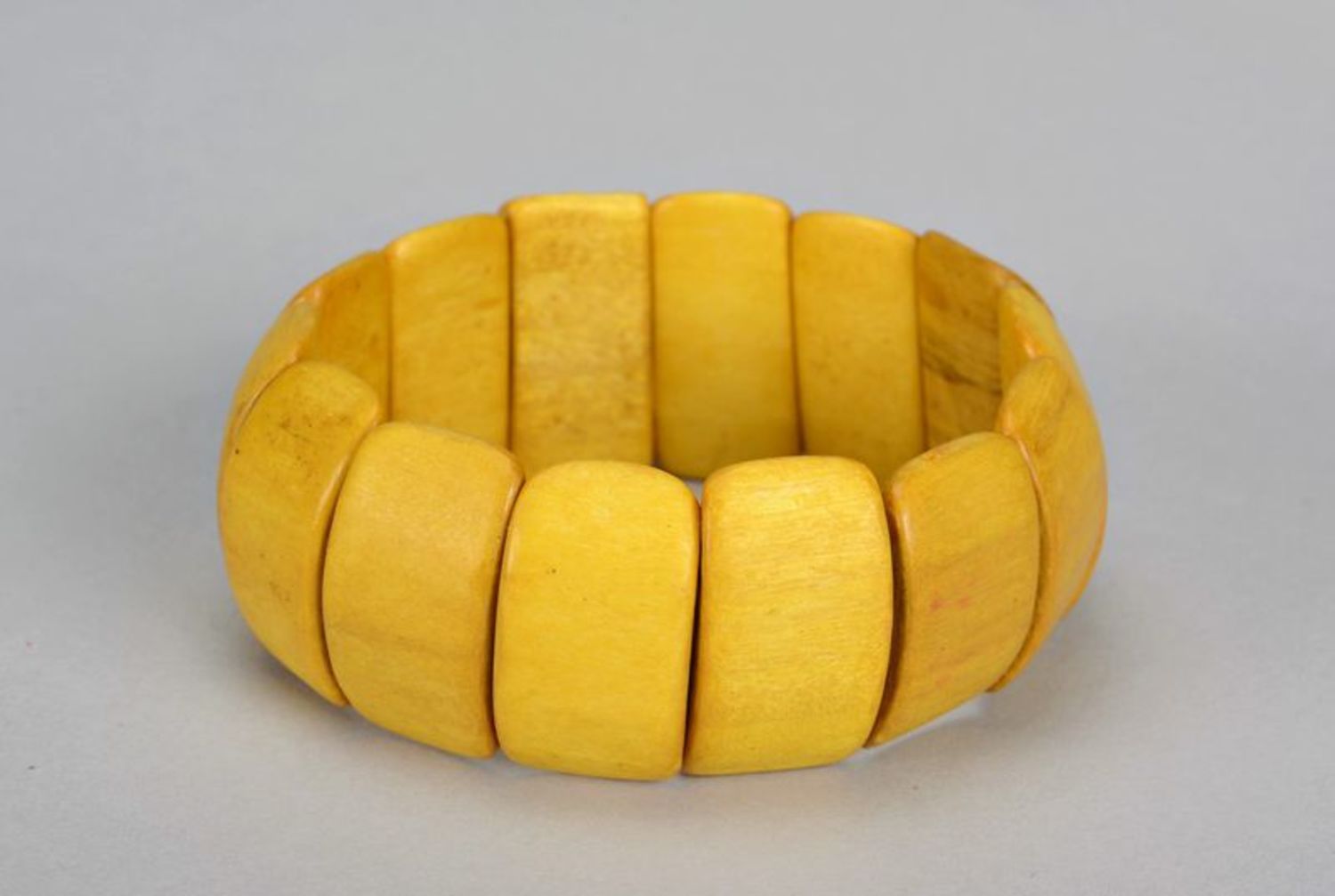 Yellow wooden bracelet photo 4