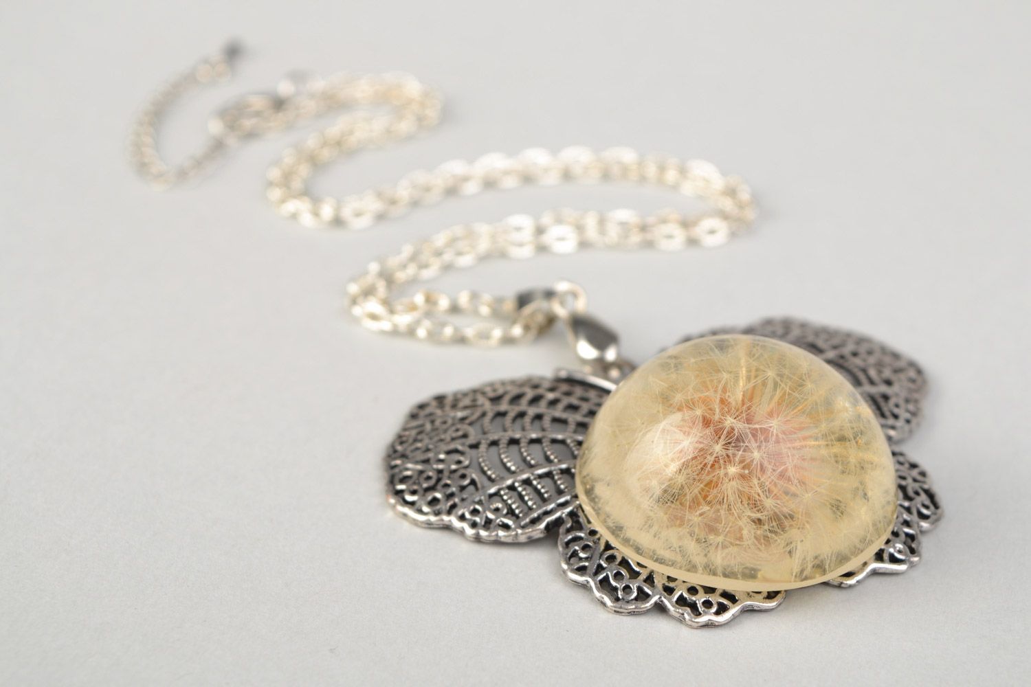 Tender handmade round pendant with dandelion flower in epoxy resin on chain  photo 4
