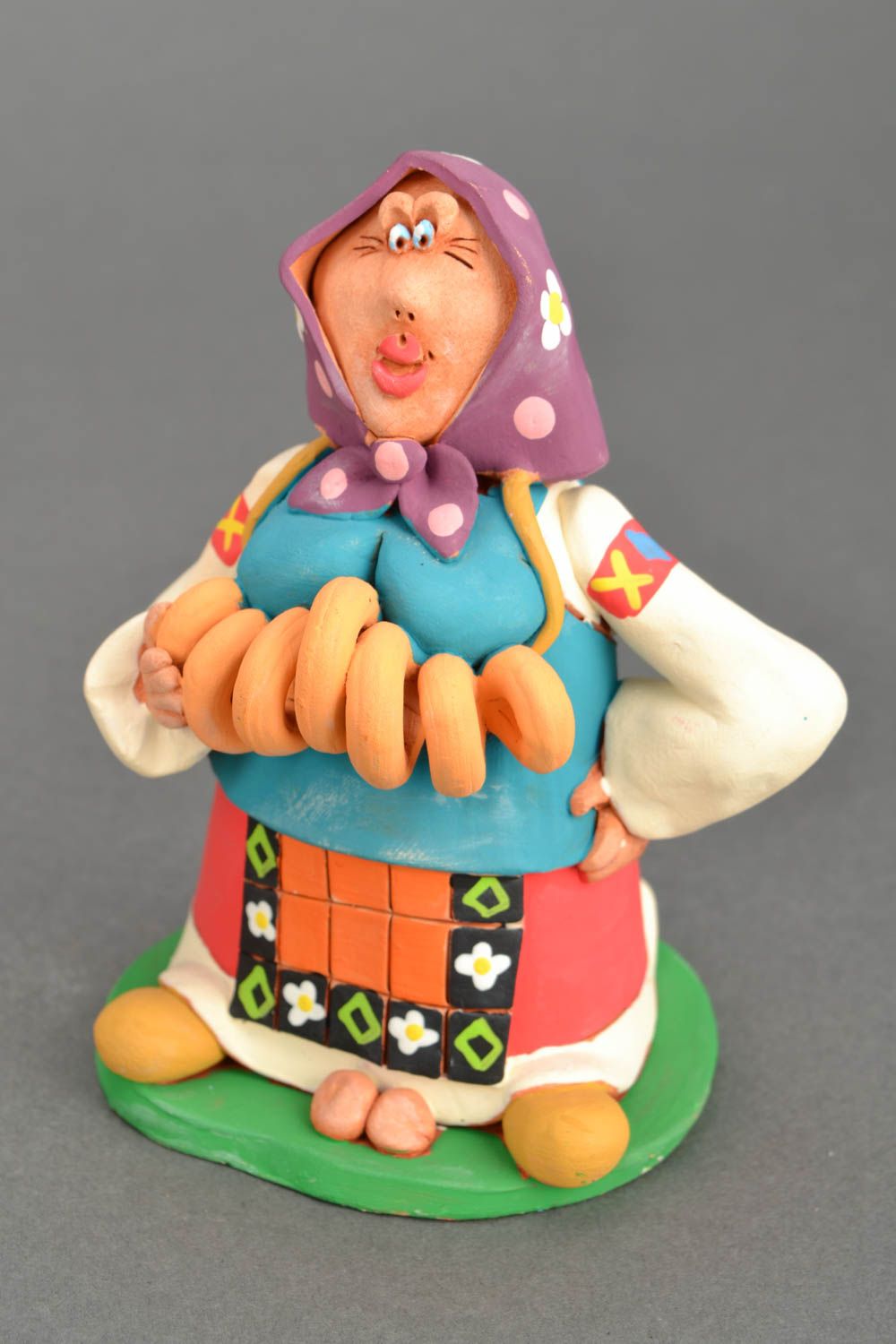 Clay statuette Woman with Donuts photo 3