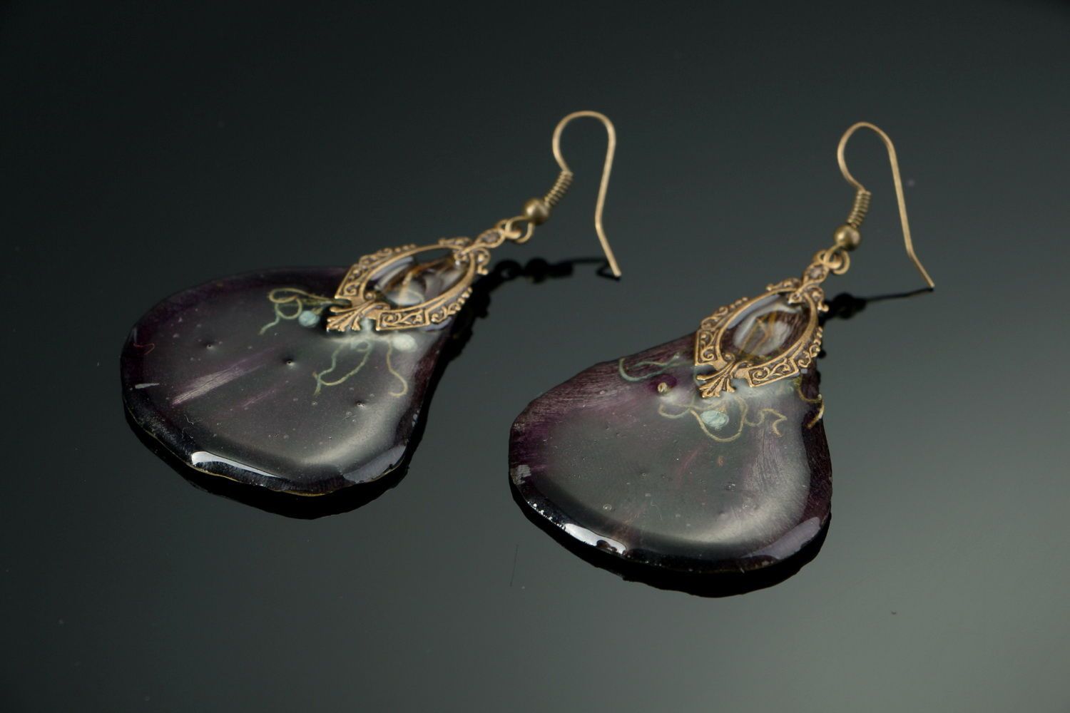 Earrings made of tulips and covered with epoxy resin photo 2