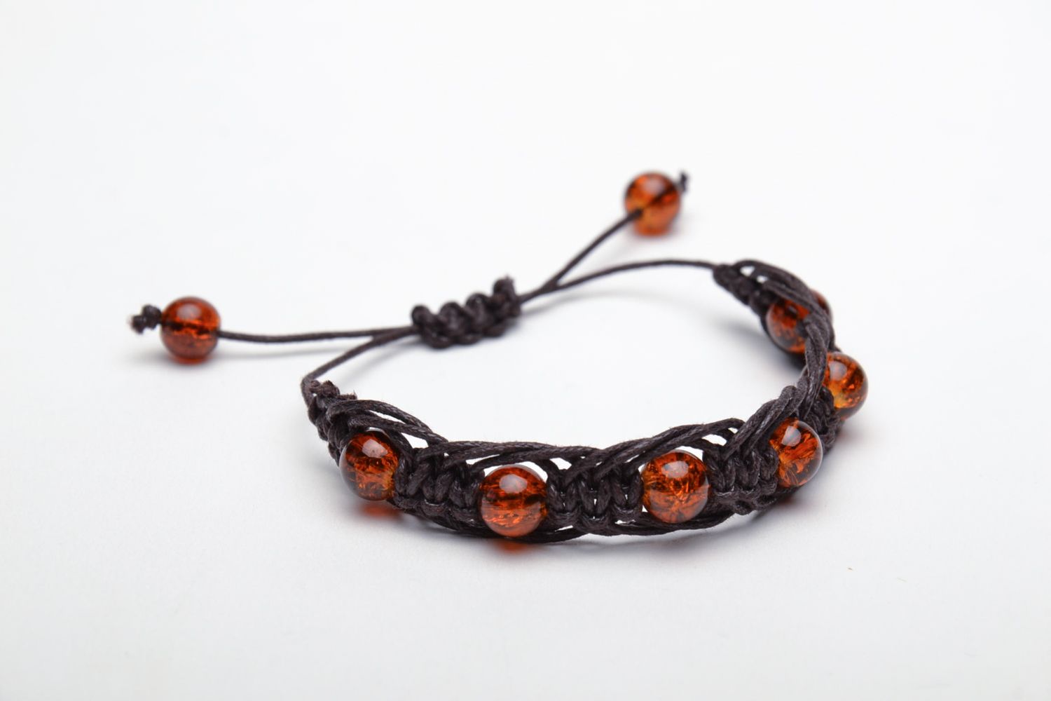 Bracelet with glass beads of amber color photo 3