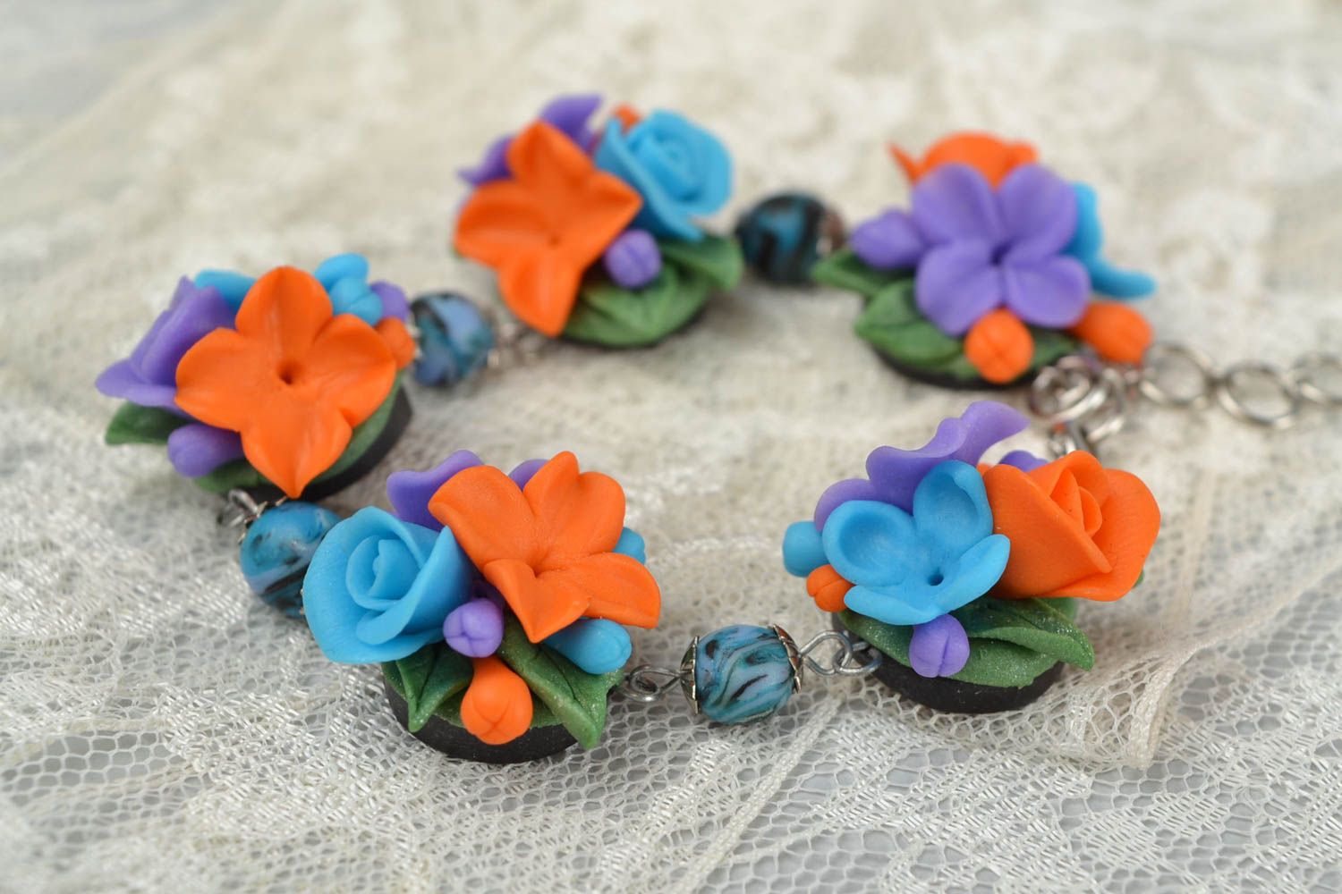Handmade stylish wrist bracelet with flowers made of polymer clay on metal chain photo 2