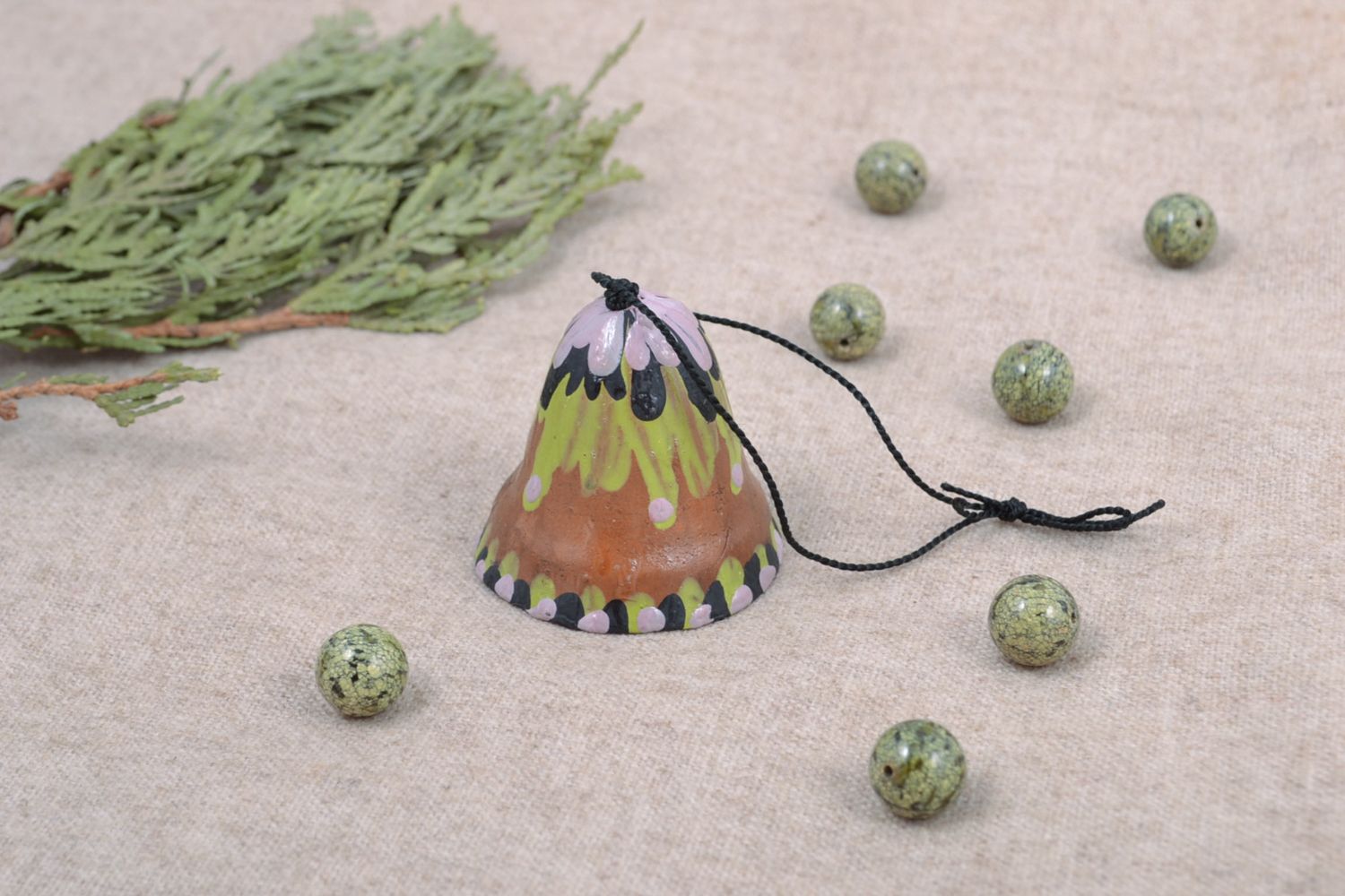 Ceramic bell with painting and cord photo 1