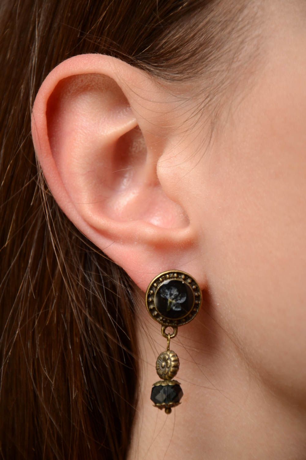 Unusual handmade dangle earrings with dried flowers coated with epoxy photo 2