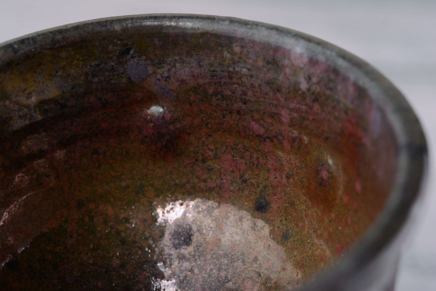 Handmade dark ornamented ceramic goblet created using reduction firing technique photo 3