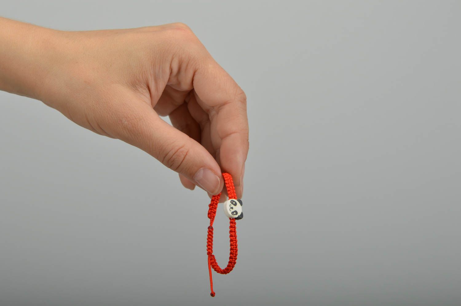 Bracelet tressé avec une perle en forme de panda rouge original fait main photo 2