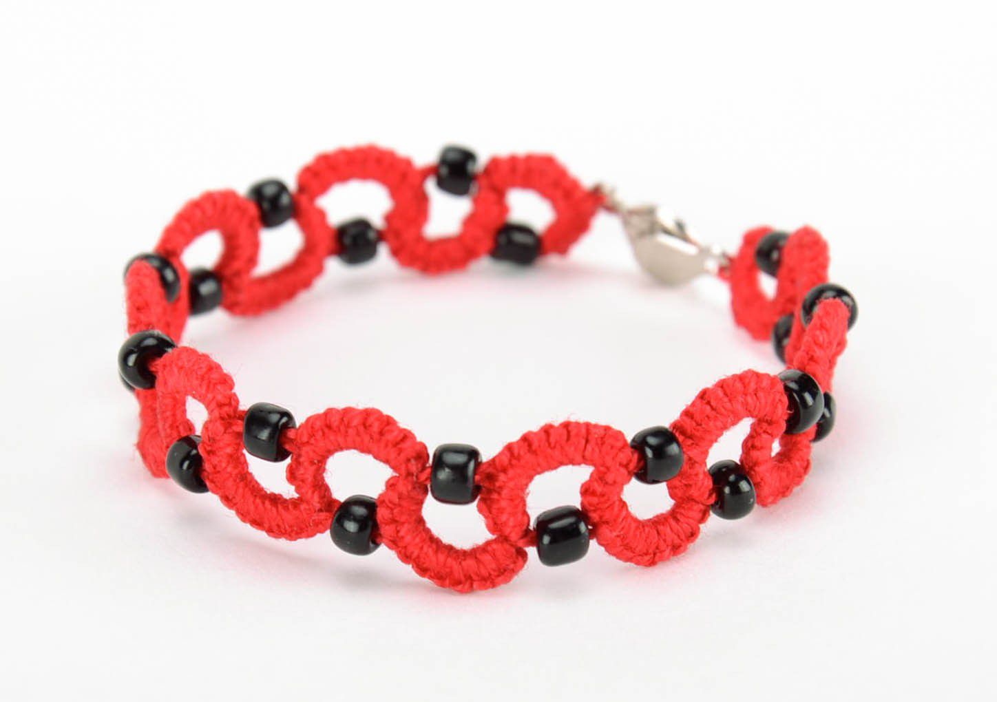 Red bracelet woven from cotton threads photo 3