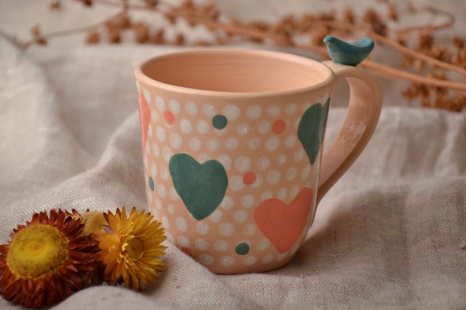 Peach color ceramic glazed teacup for a girl with a heart pattern photo 1