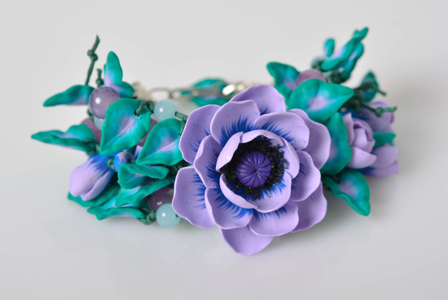 Handmade designer wrist bracelet with blue volume polymer clay flowers photo 1