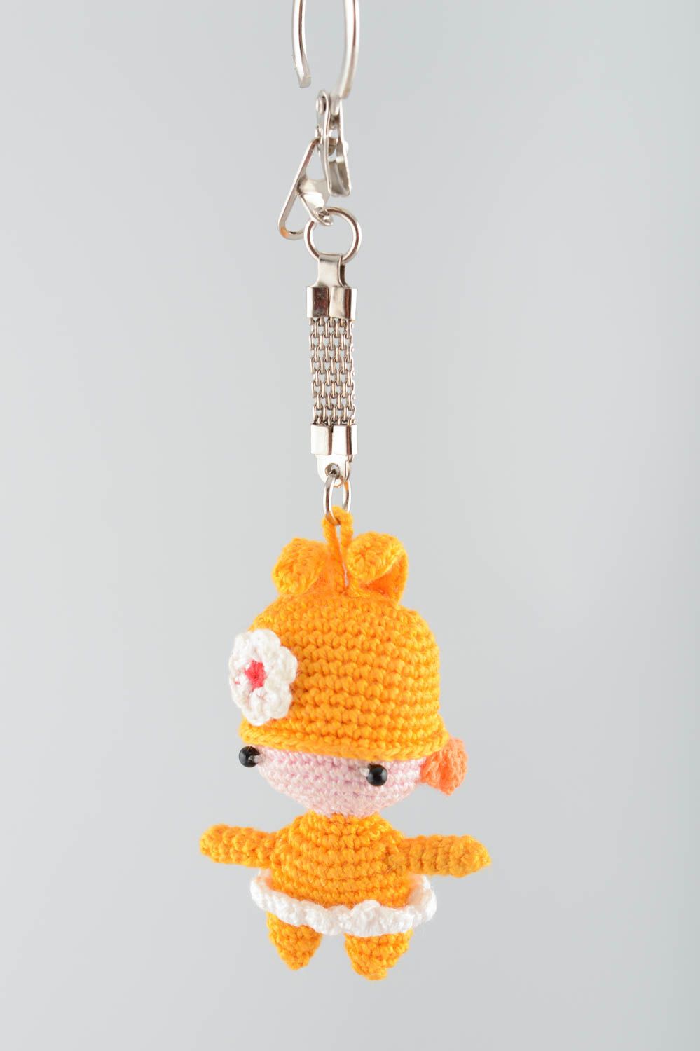 Keychain soft toy in the form of a cute girl handmade decorative amigurumi art  photo 3