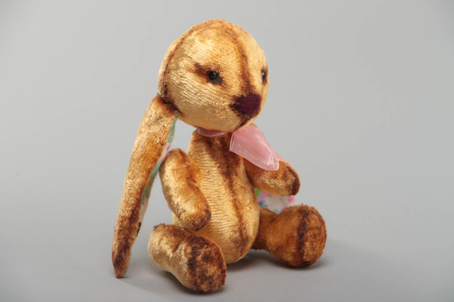 Soft handcrafted rabbit toy with long ears for children made of plush  photo 2