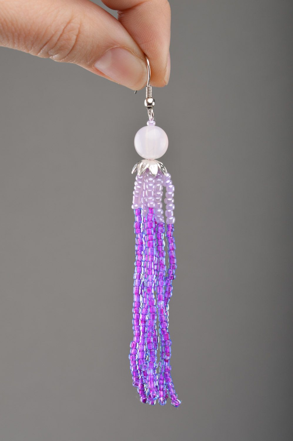 Handmade women's lilac long beaded earrings with charms  photo 2