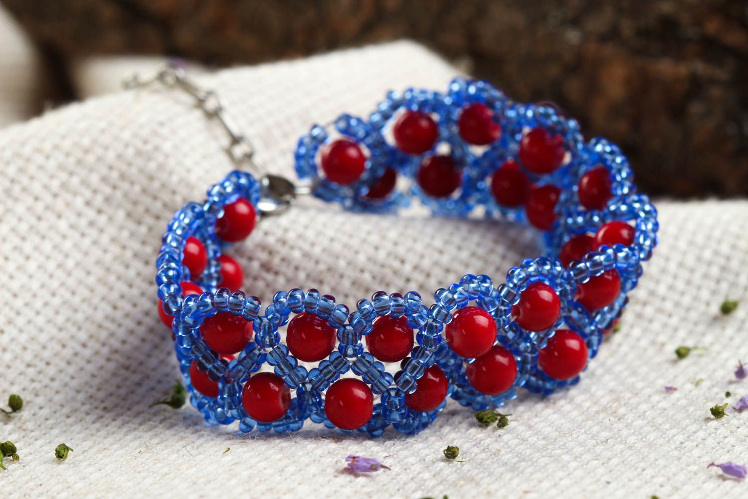 Blue and red beads bracelet on the adjustable chain photo 1
