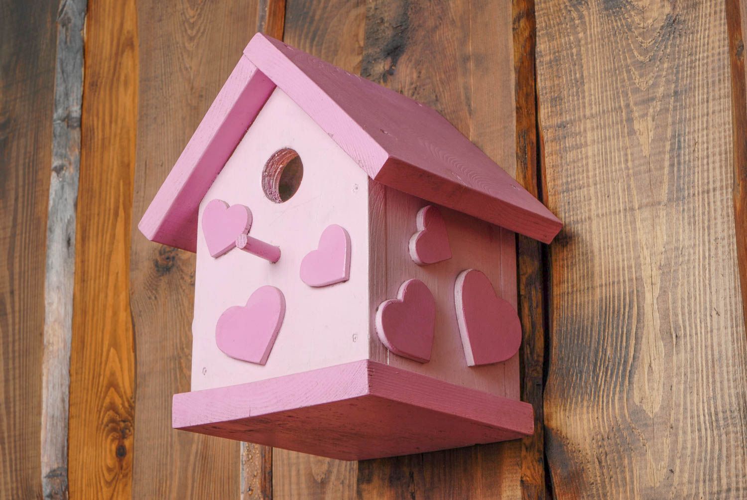 Pink wooden birdhouse photo 4