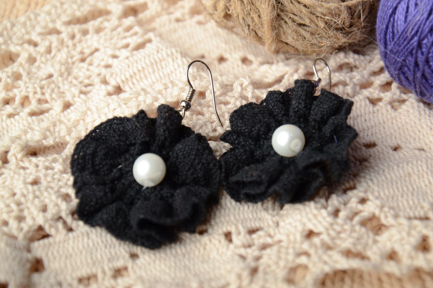 Beautiful lace earrings with pearls in the shape of black flowers photo 1