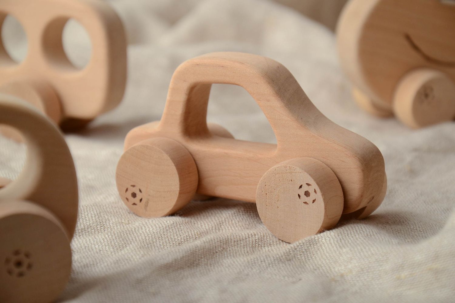 Wooden wheeled toy car for children photo 1