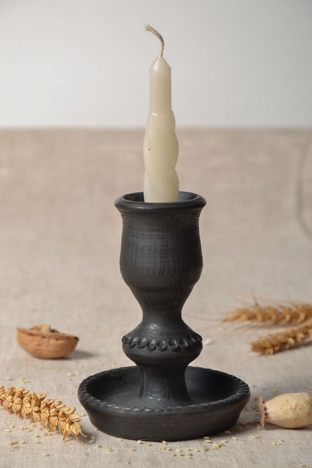 Handgemachter Kerzenhalter aus Ton foto 1