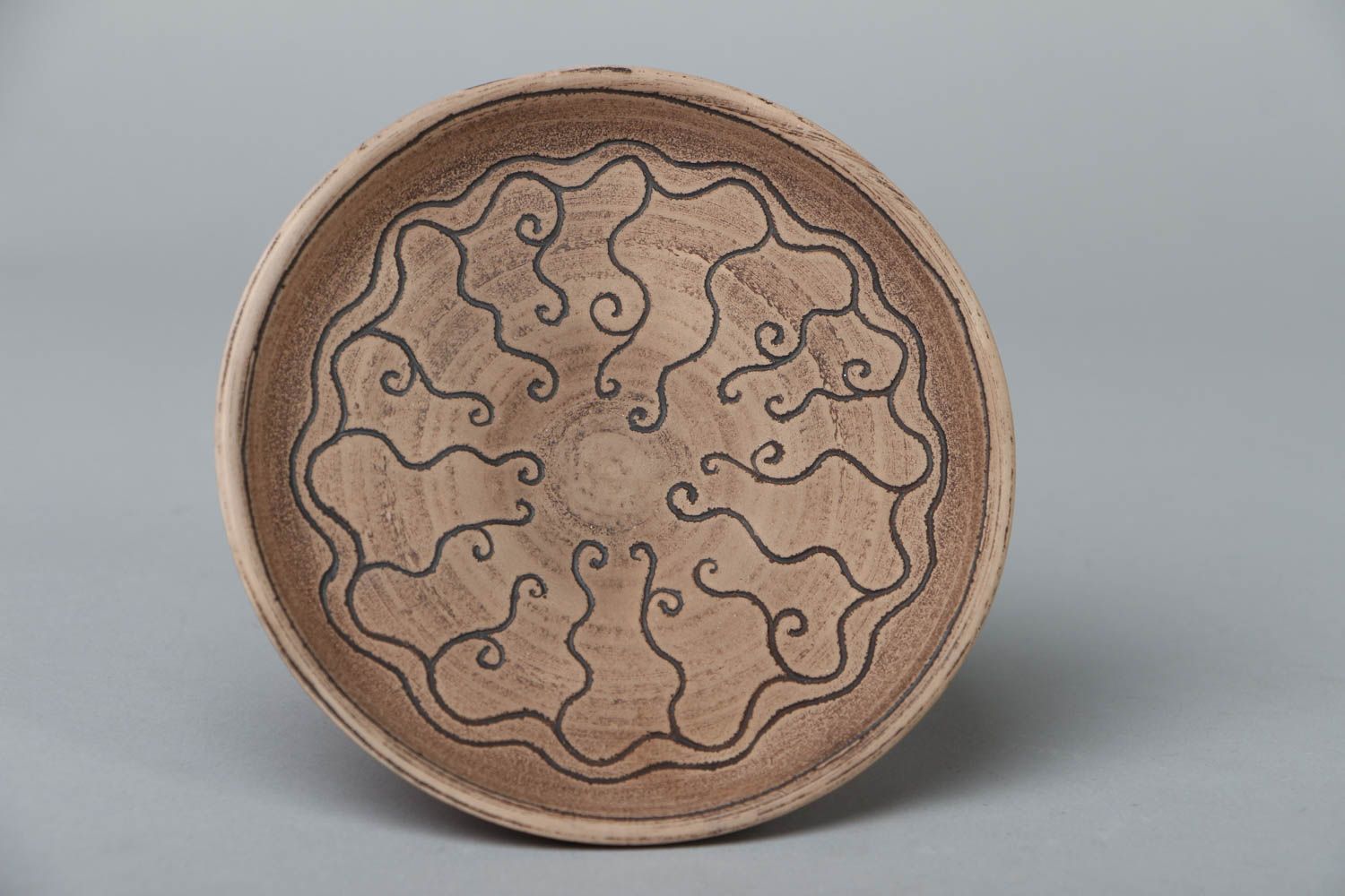 Ceramic saucer with beautiful patterns photo 1