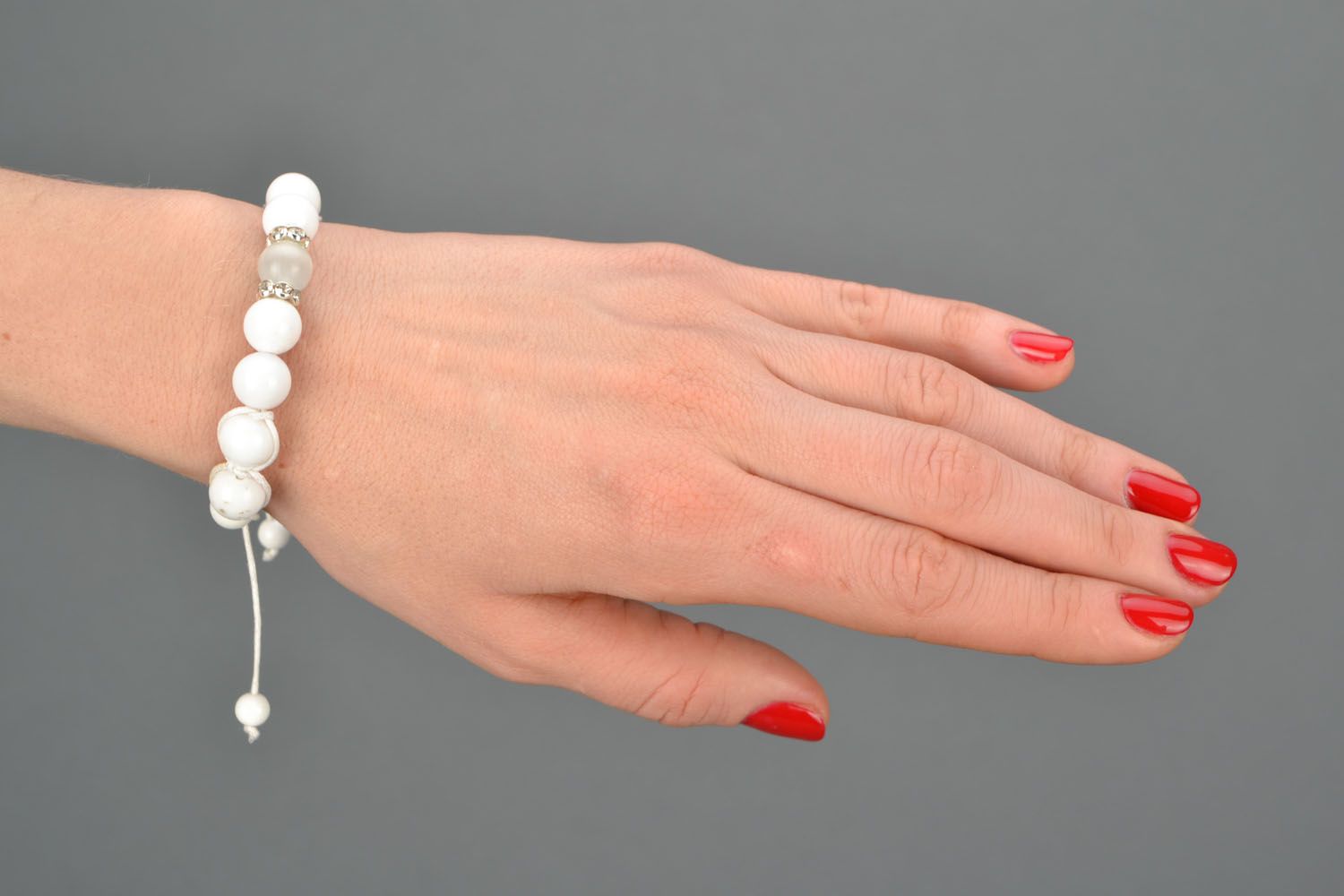 White bracelet with natural stones photo 1
