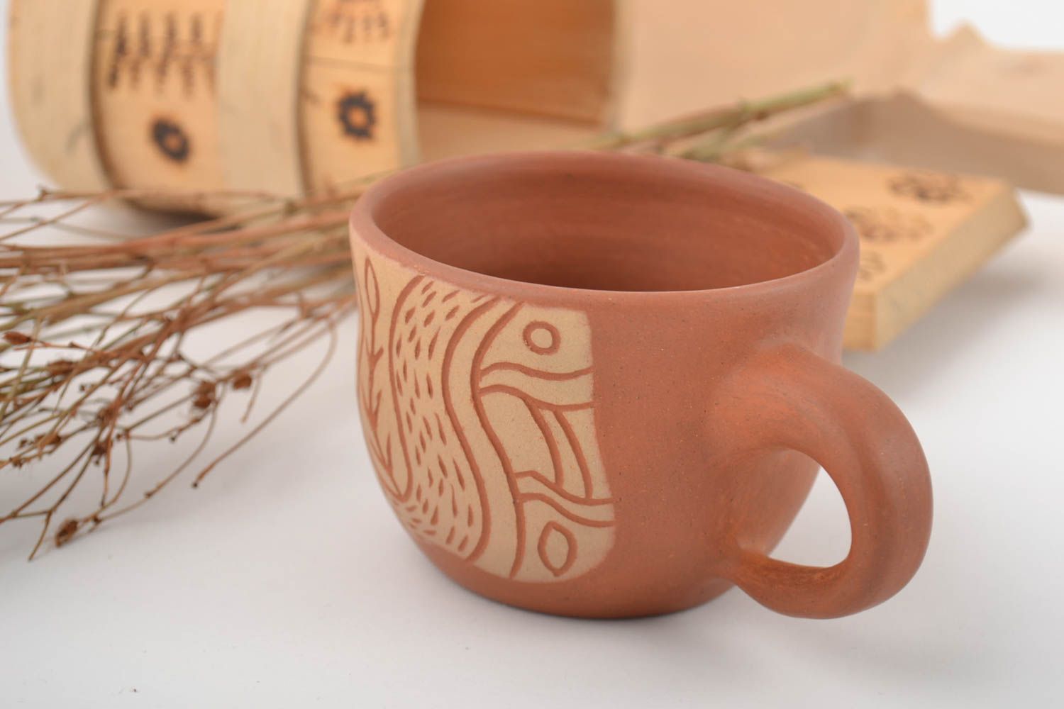 8 oz clay cup in terracotta and beige color with cave drawings photo 1