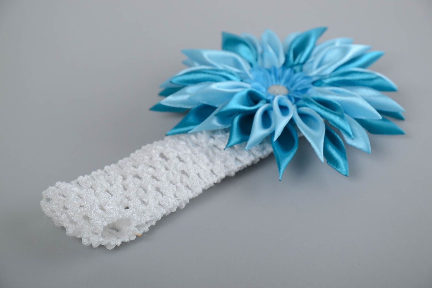Children's white handmade elastic headband with blue satin flower photo 3