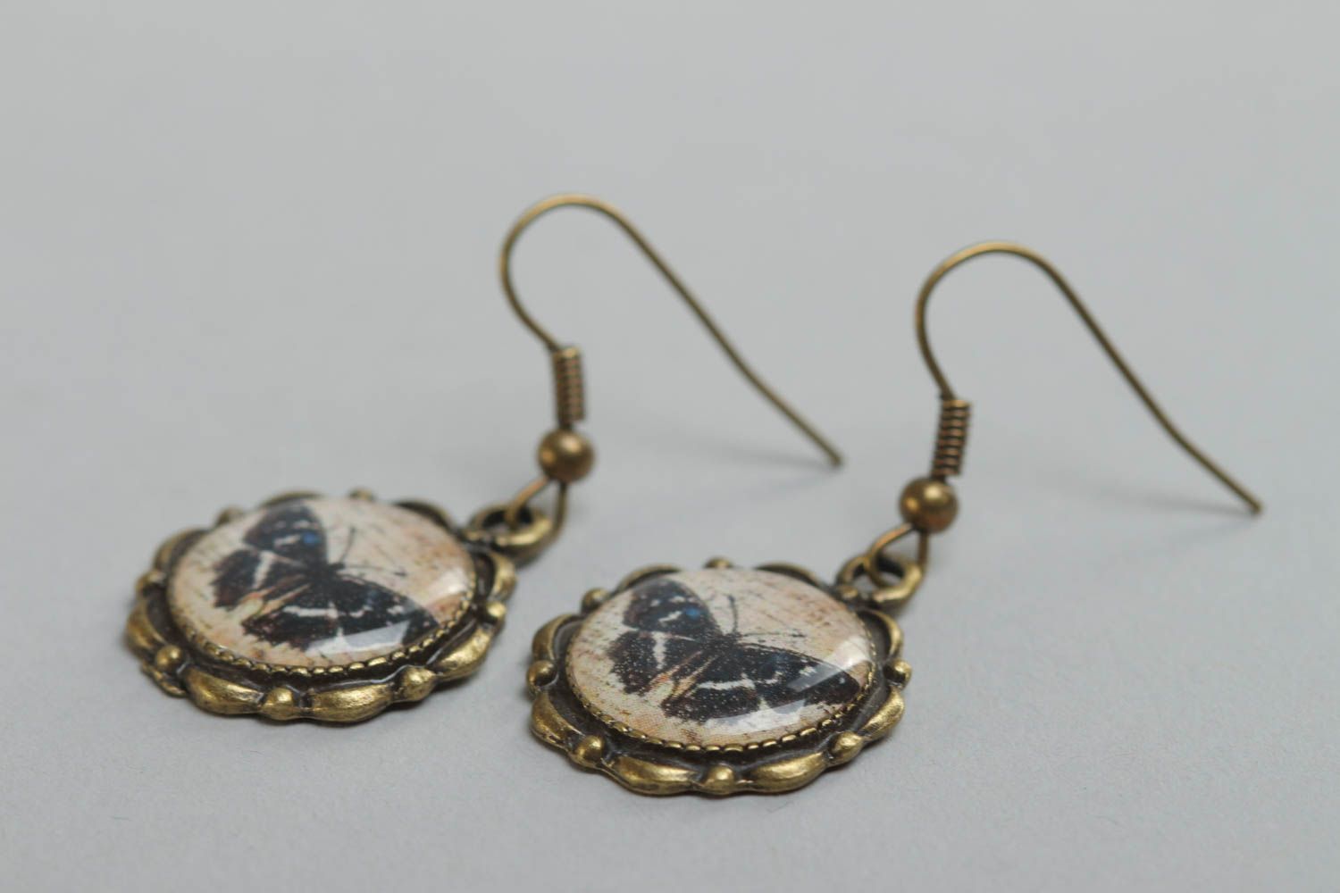 Handmade round metal and glaze earrings with butterflies photo 3