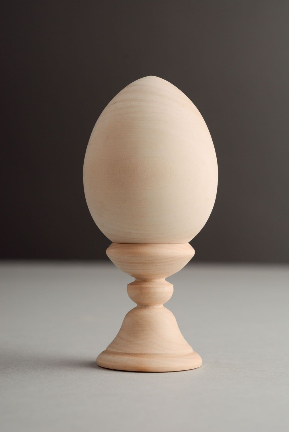 Wooden blank egg on a stand photo 1