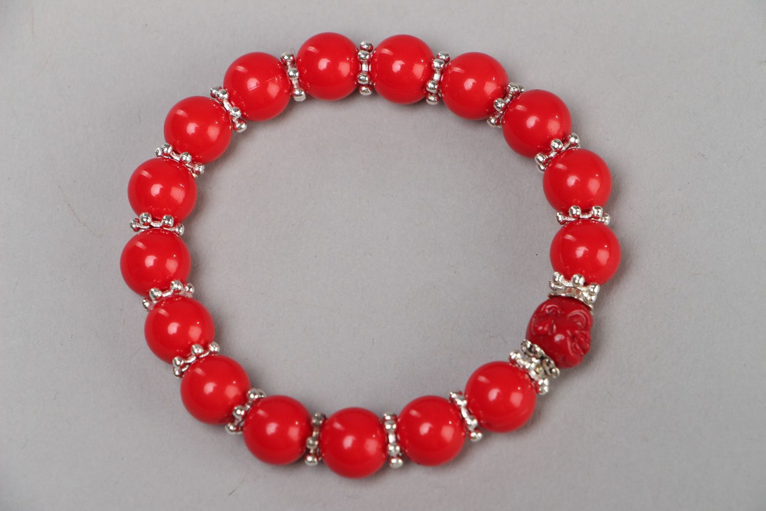 Handmade laconic stretch wrist bracelet with plastic beads of red color for women photo 2