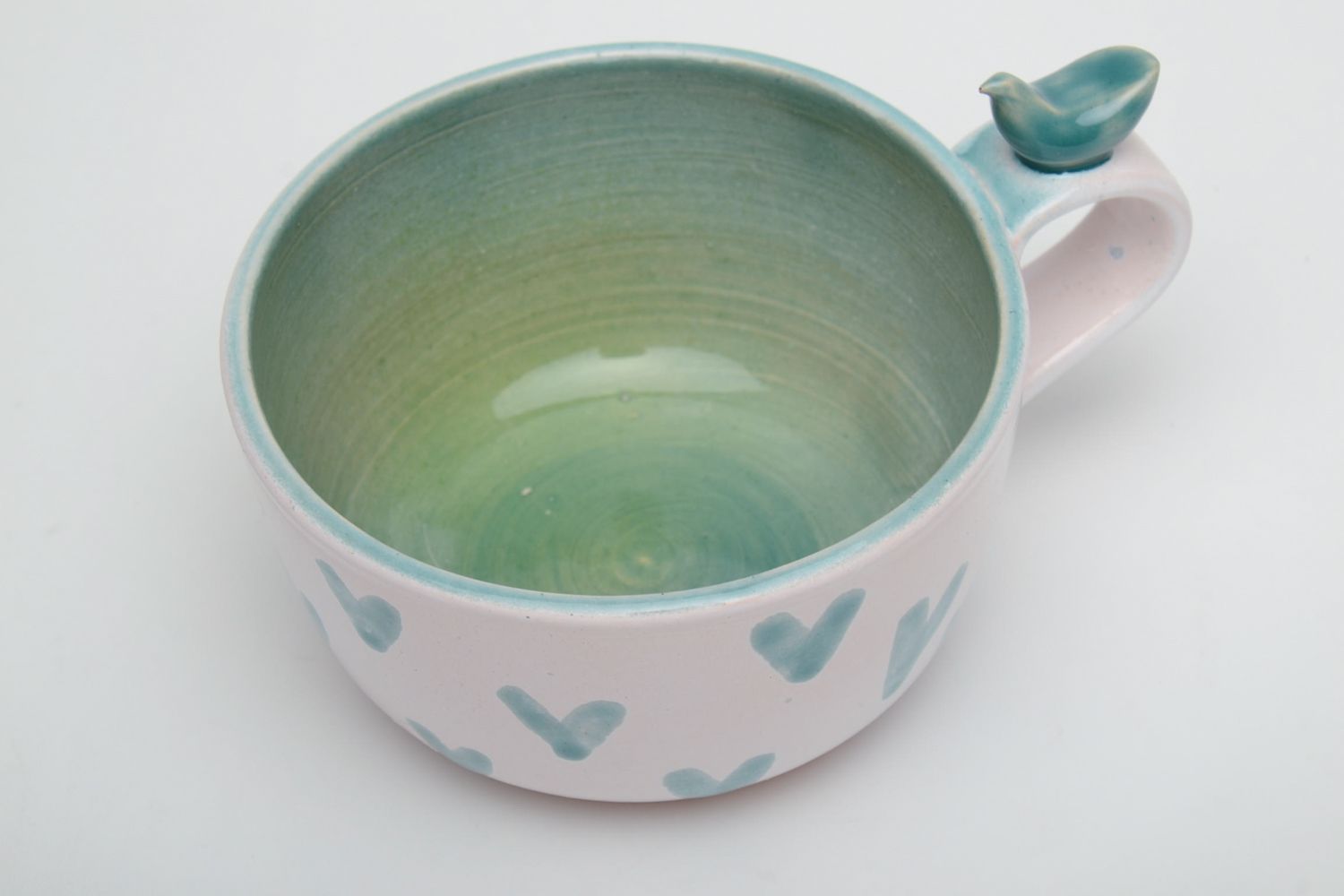 Глиняная чашка расписанная эмалью и глазурью с птичкой фото 3