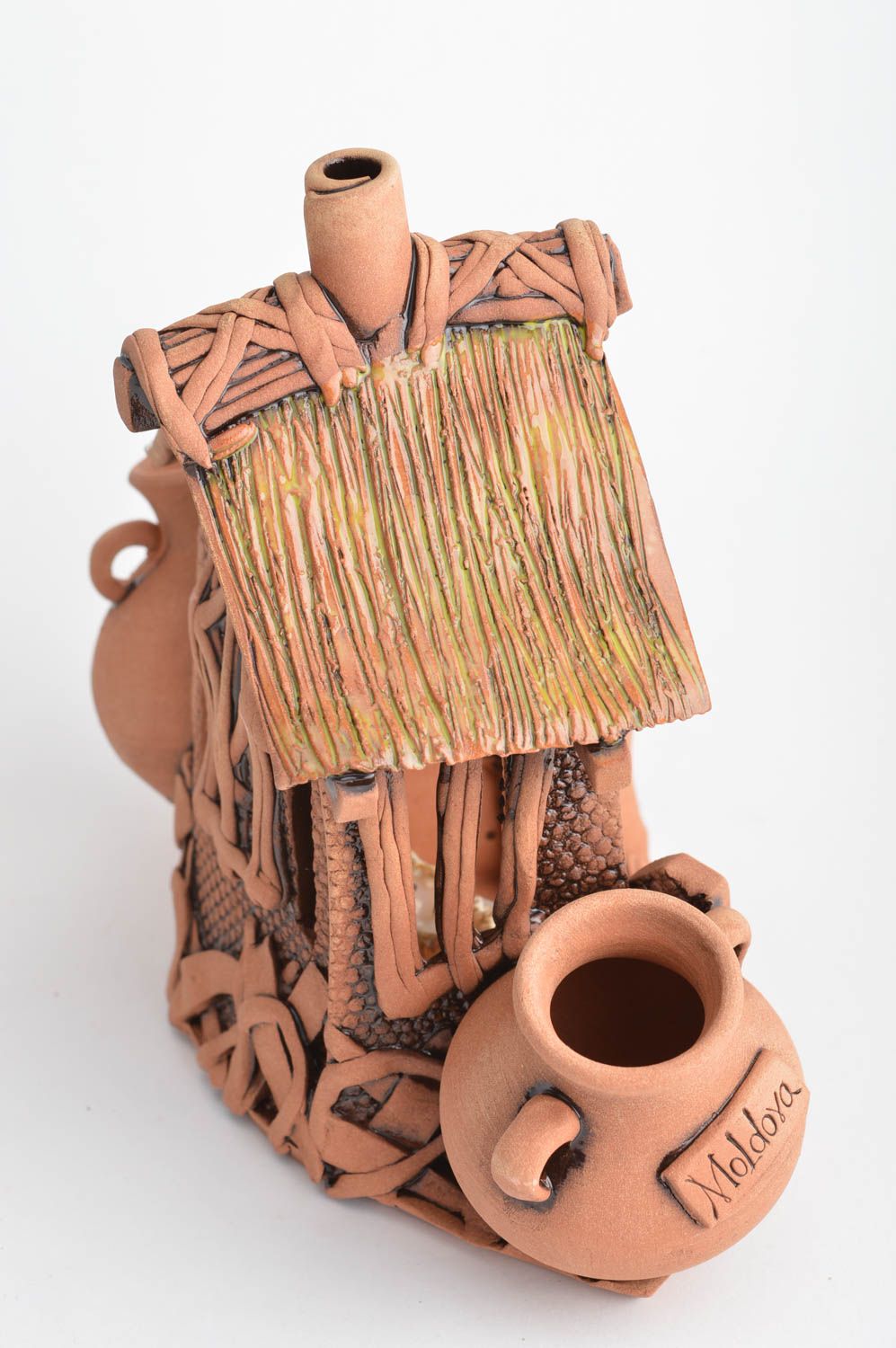 Candelero de cerámica decorativo hecho a mano para una vela casita foto 2