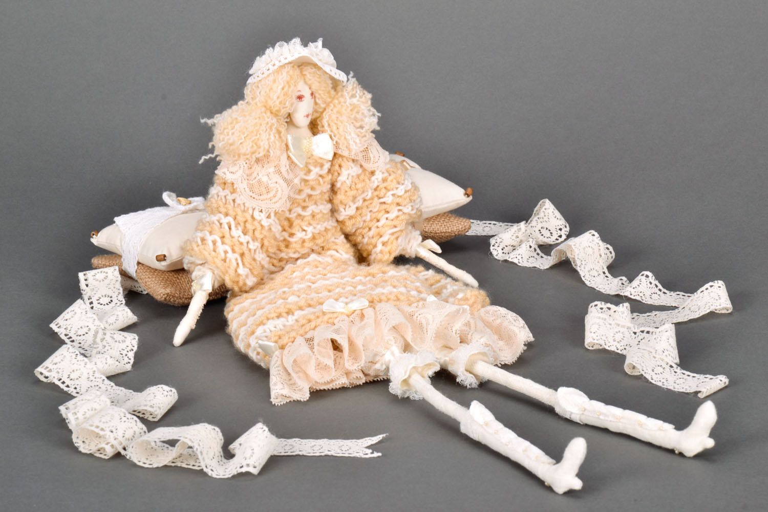 Designer knitted doll in cream dress photo 1