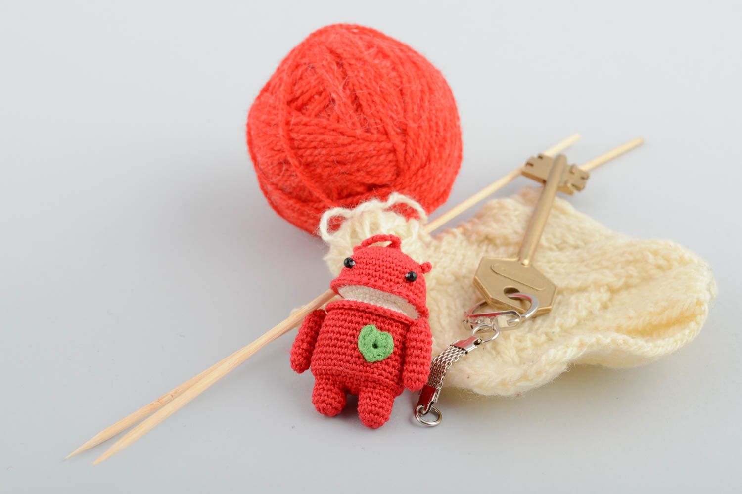 Keychain soft toy made using amigurumi art handmade red accessory for purse photo 1