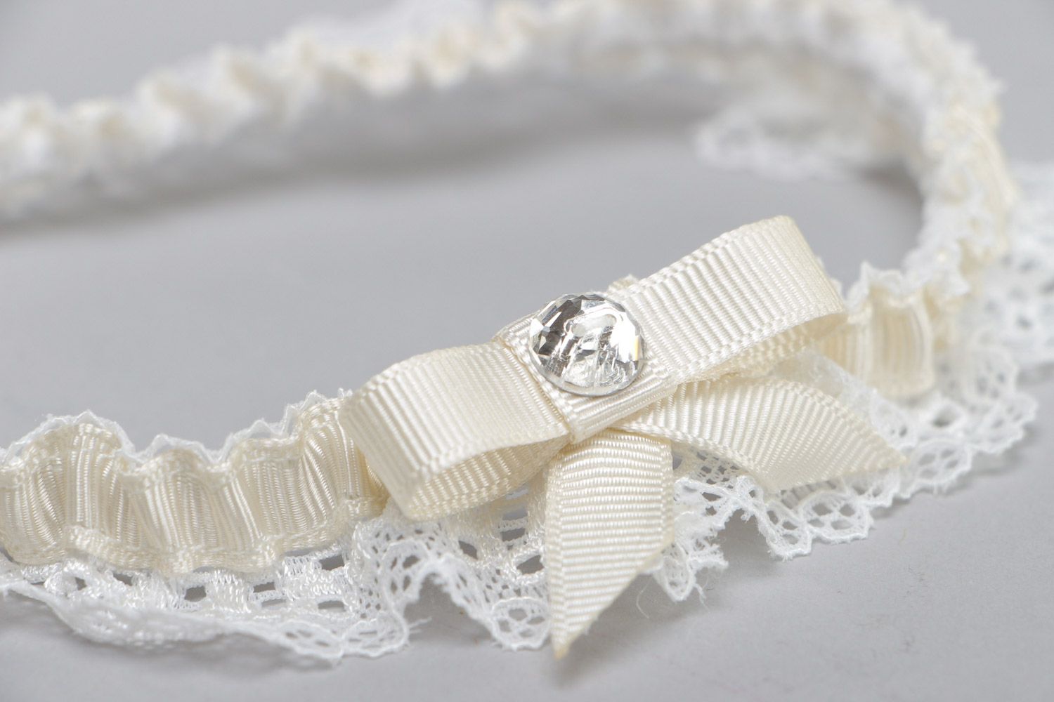 Delicate thin handmade lacy wedding bridal garter with rep ribbon and glass bead photo 3