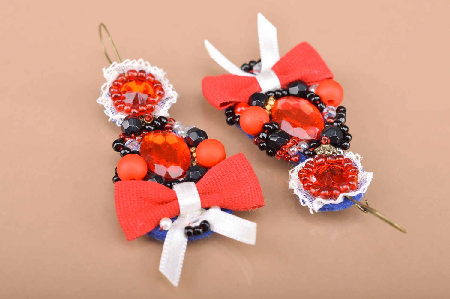 Handmade festive beaded dangle earrings with bows in red color palette for women photo 2
