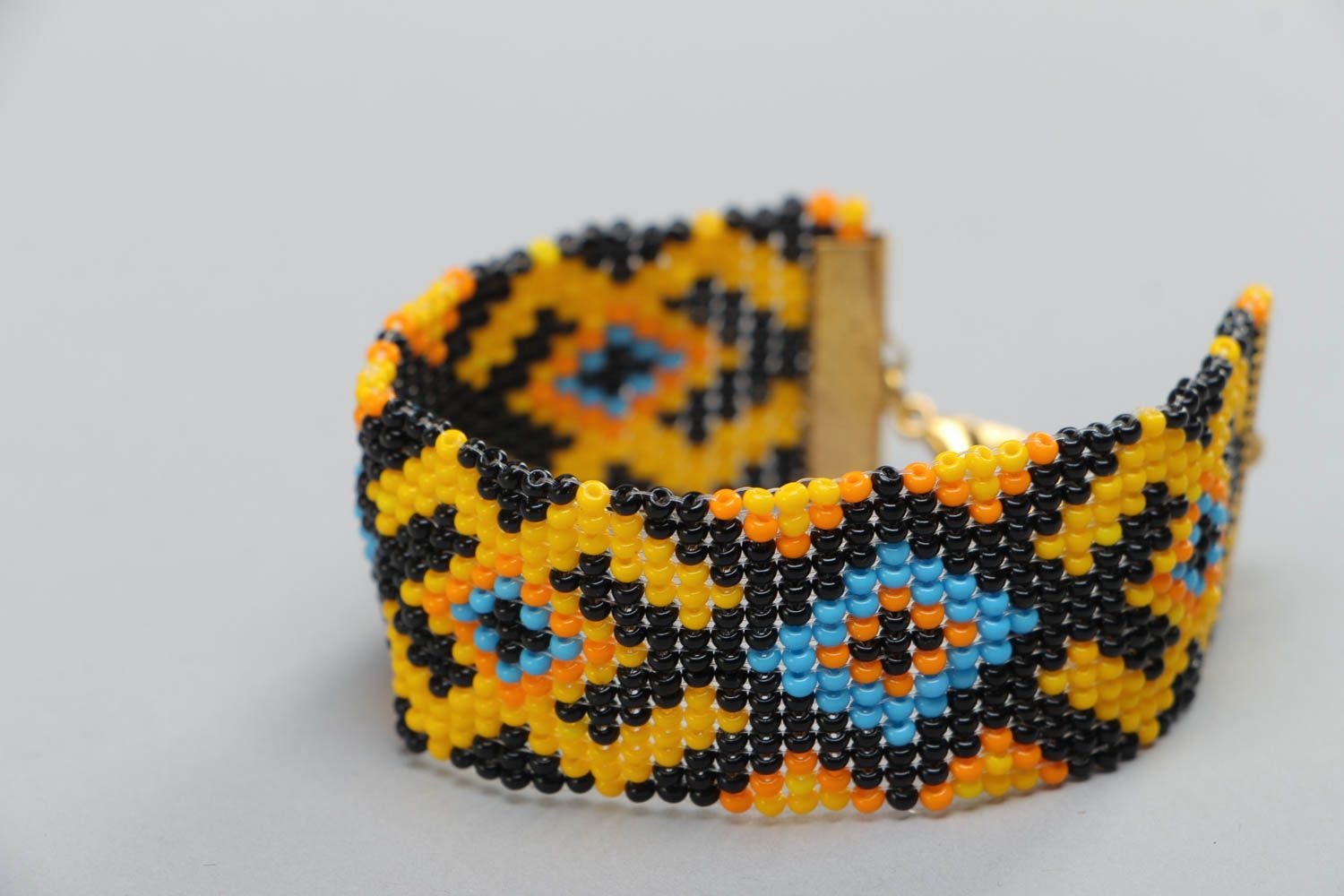 Handgemachtes buntes Armband mit Ornament aus Glasperlen im ethnischen Stil foto 2
