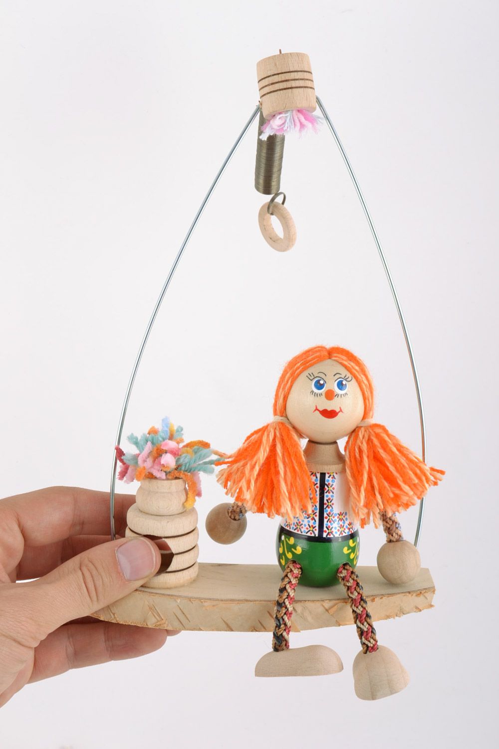 Originelles handgemachtes Öko Spielzeug aus Holz mit Sprungfeder bemalt  foto 2