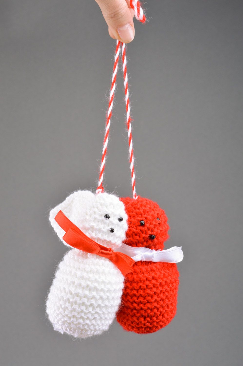 Handmade soft toy knitted of semi-woolen threads white and red rabbits  photo 3