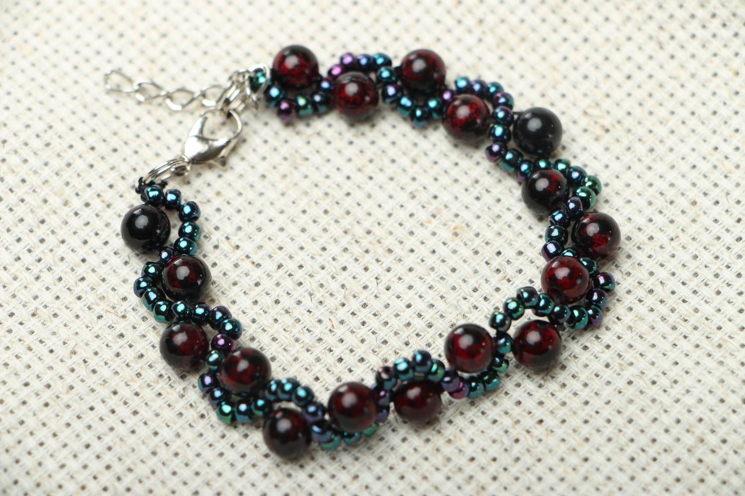 Handmade bracelet with garnet and seed beads photo 1