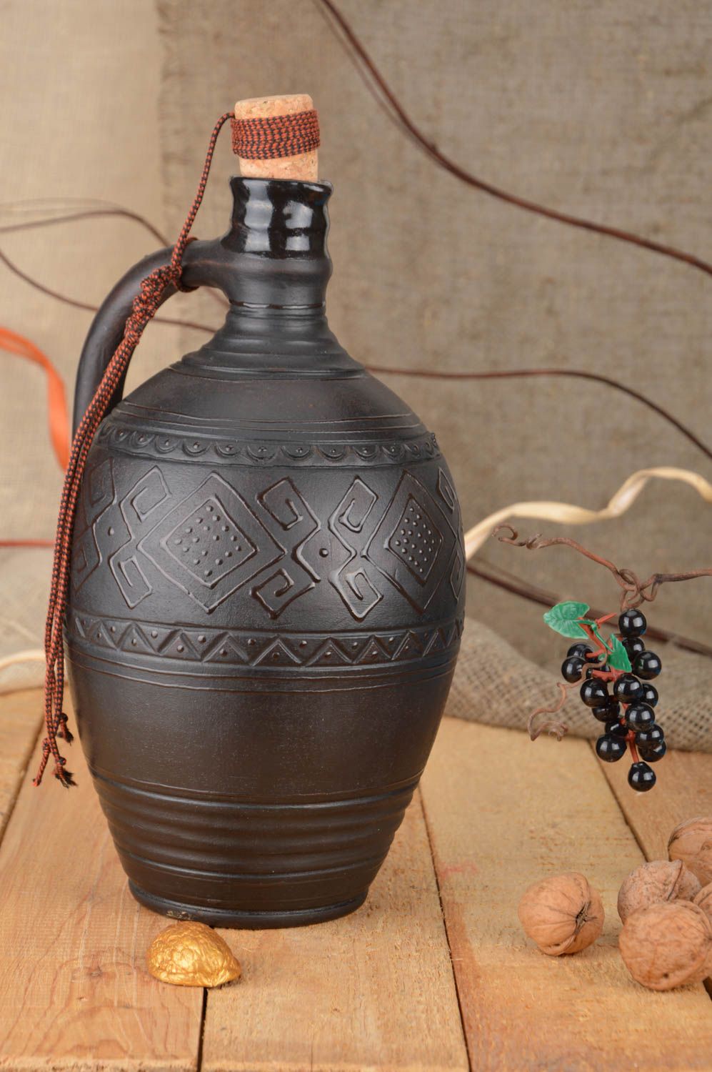 Unusual beautiful homemade dark ceramic bottle with pattern and cork 2 l photo 1