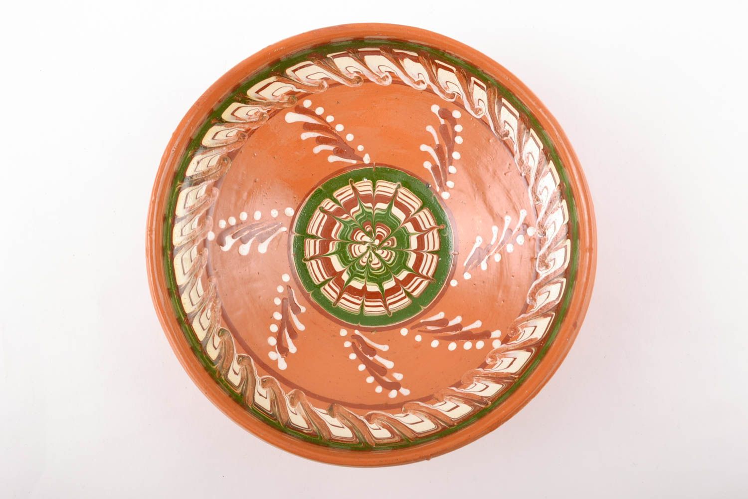 Handmade ceramic bowl with ornament painted using flyandrovka technique photo 2