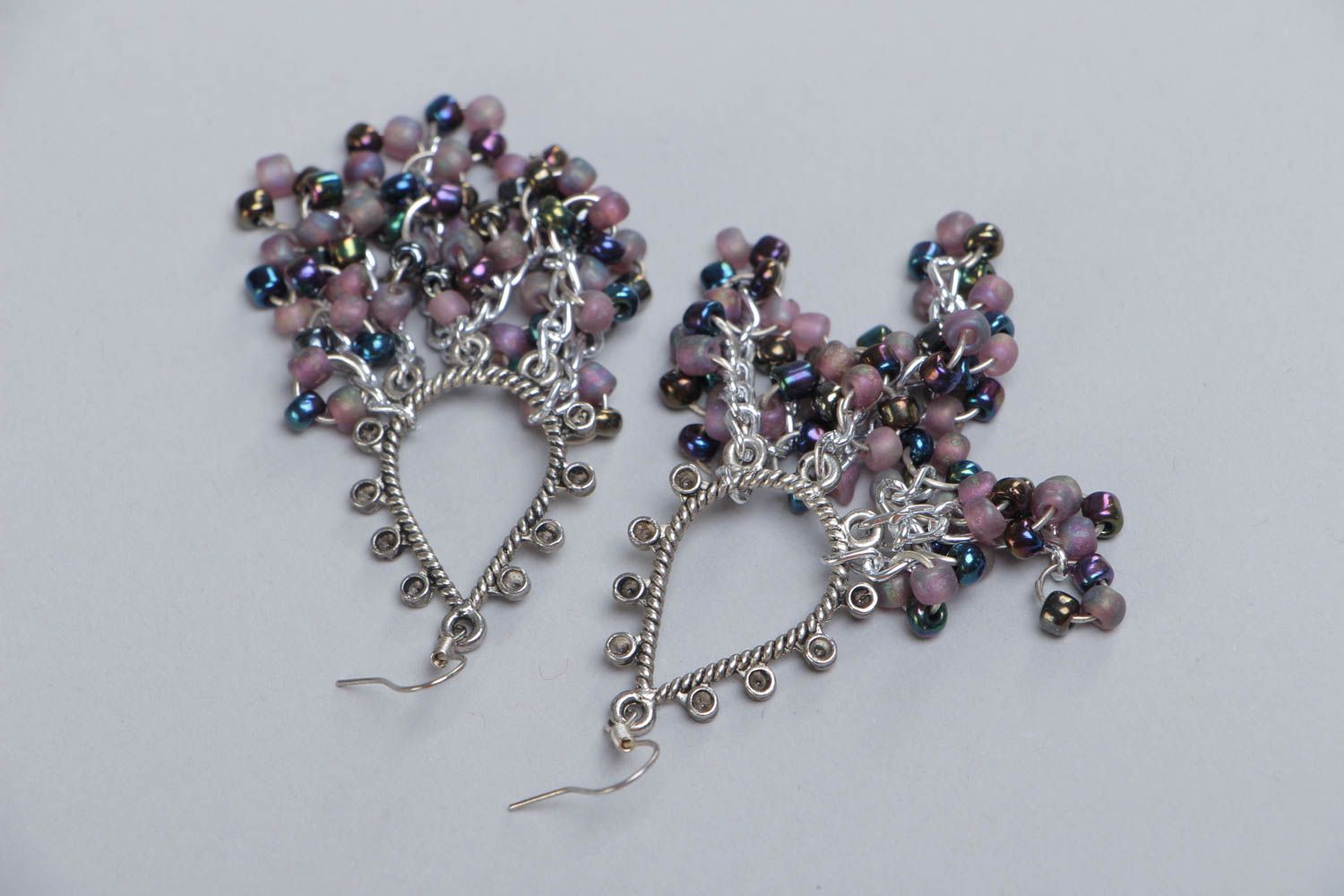 Long metal handmade earrings decorated with small beads photo 4