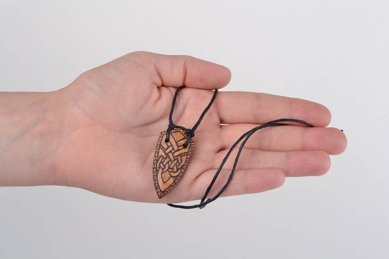 Handmade designer wooden pendant necklace with ornament in ethnic style on cord photo 2