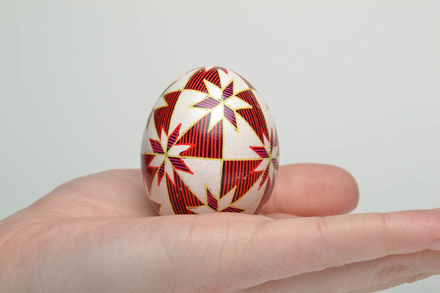 Painted egg with traditional symbolics photo 5