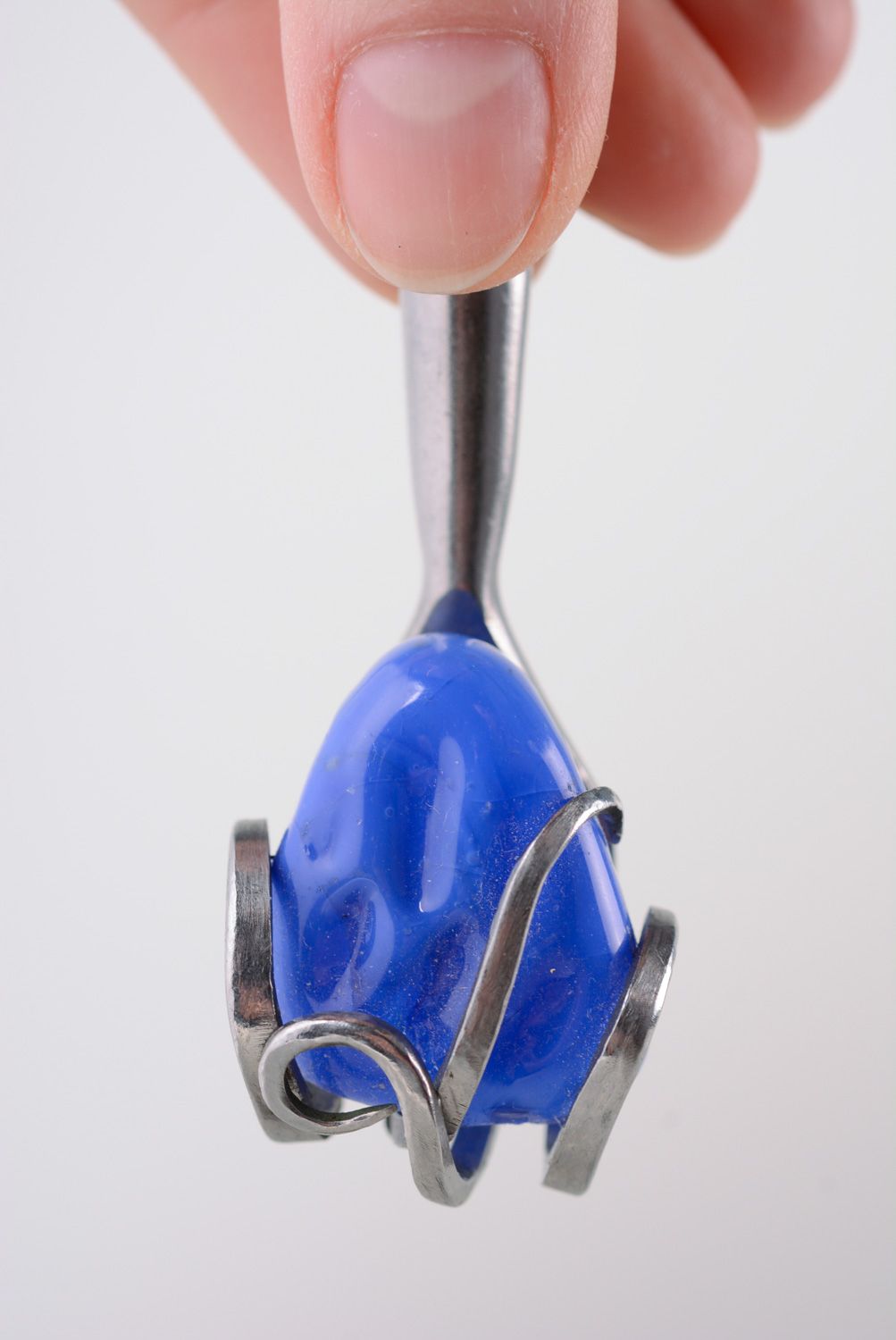 Homemade metal pendant made of cupronickel fork with blue artificial stone photo 3