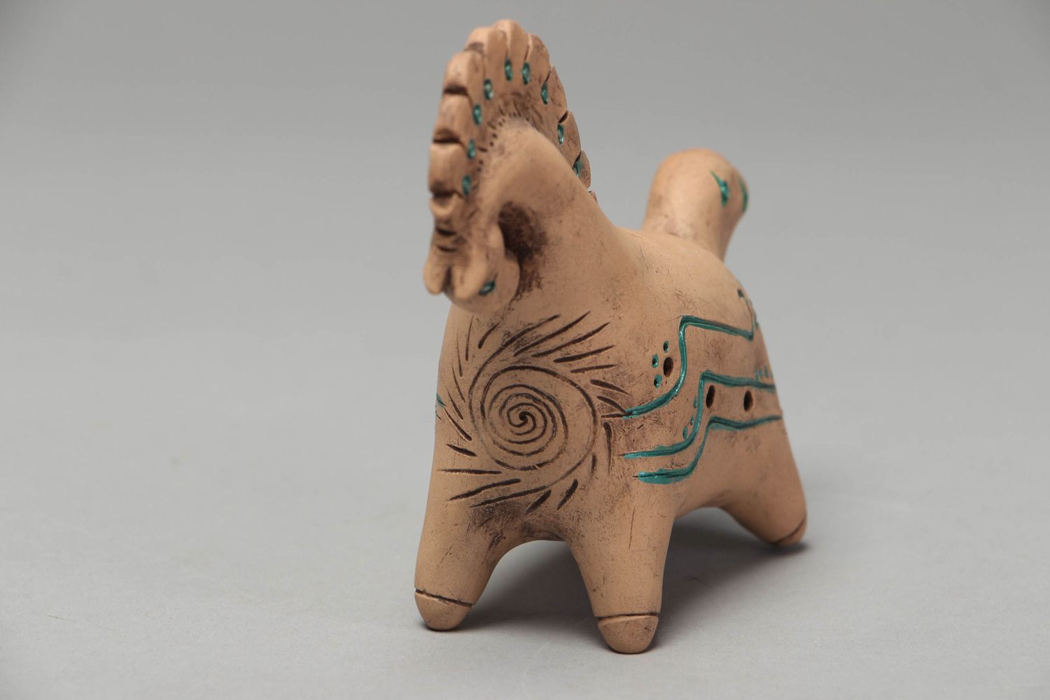 Clay penny whistle in the shape of horse photo 2
