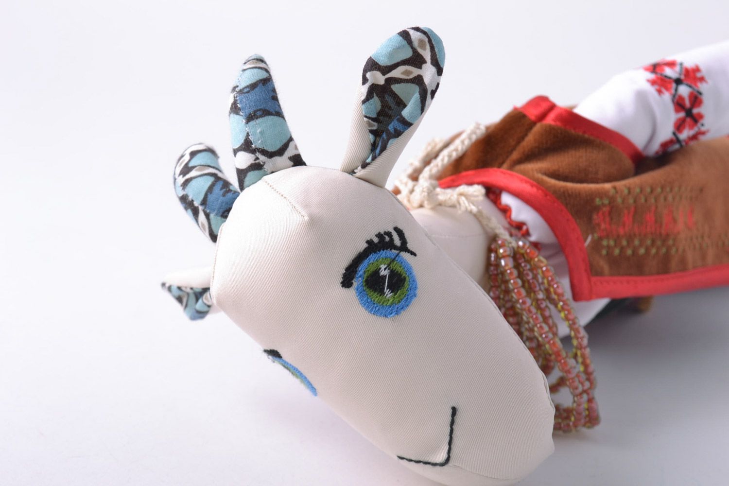 Handmade designer soft toy sewn of fabric tall goat in ethnic clothing photo 3
